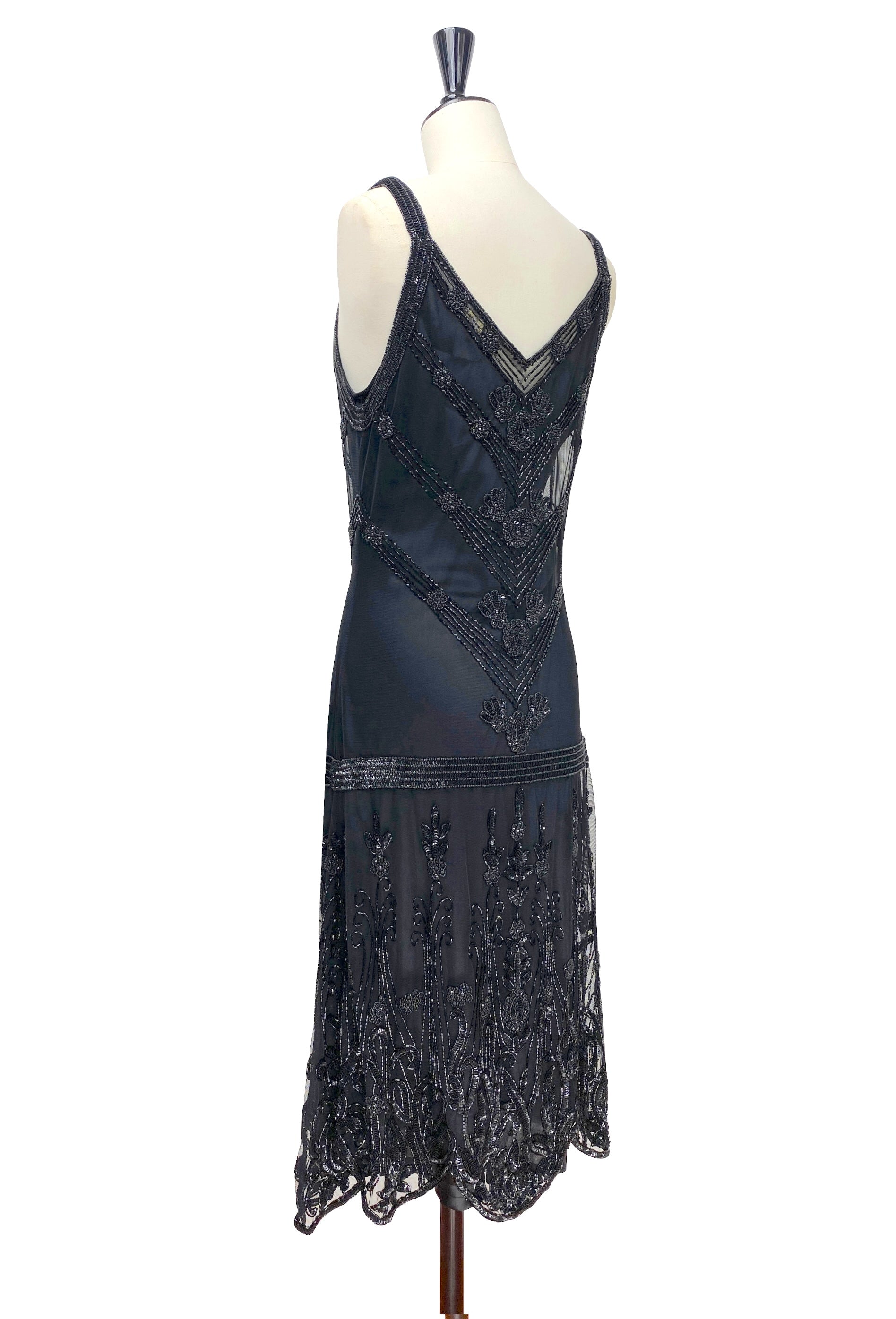 Sleeveless beaded slip dress with V-back and geometric beading; scalloped fringe hem
