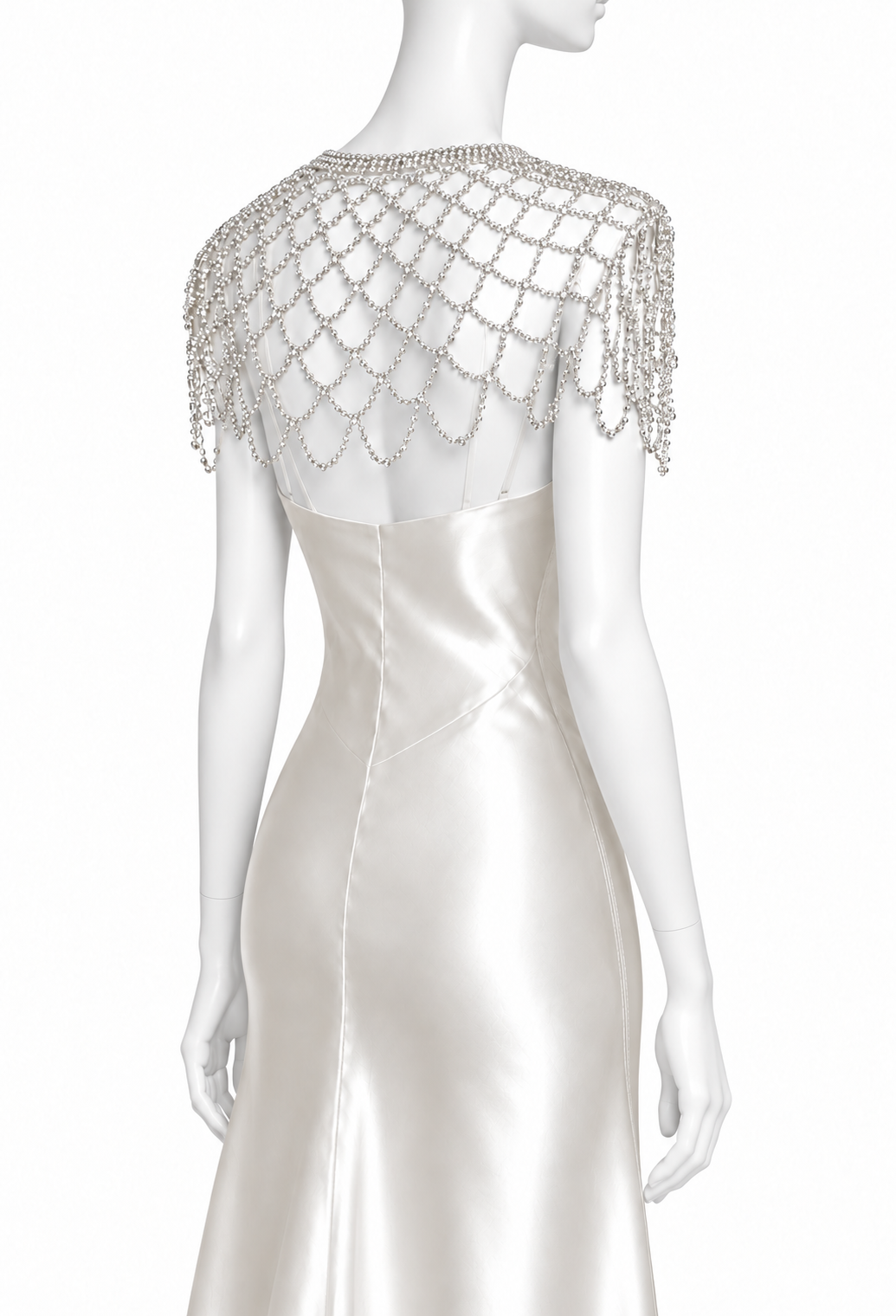 Silver rhinestone capelet with draped chain fringe over the shoulders