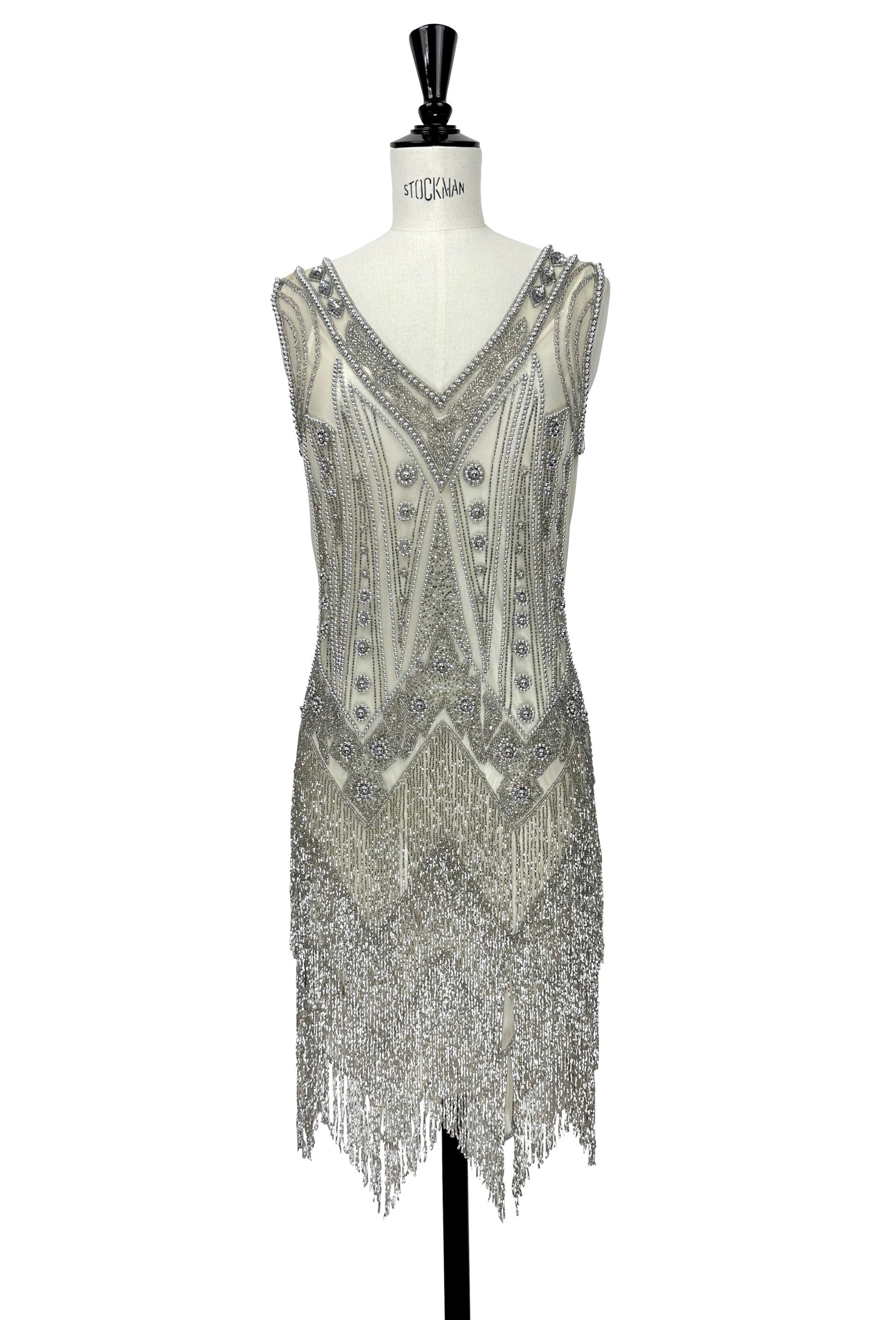 Beaded V-neck sleeveless gown with fringe hem, silver-gray on mannequin