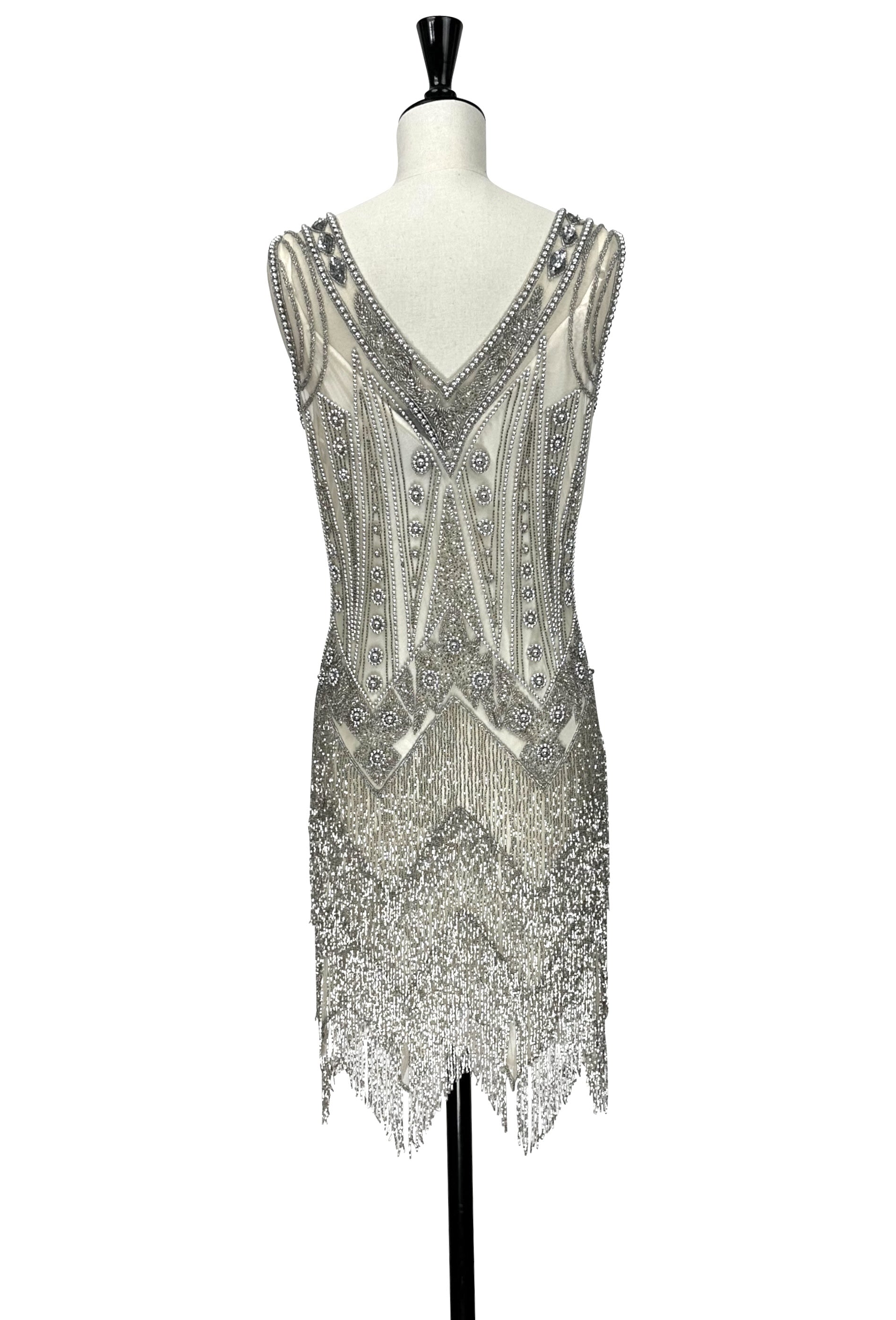 Beaded sleeveless low V-back gown in silver-gray with fringe hem