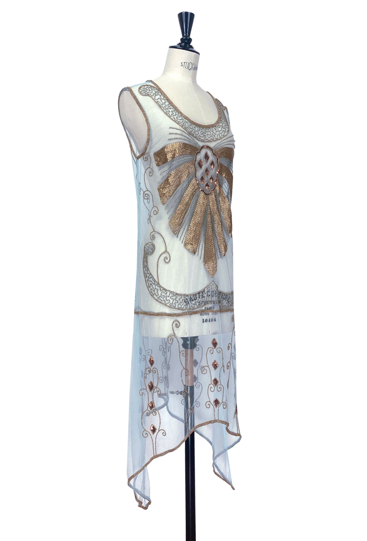 Sleeveless turquoise overlay dress, side view with gold filigree and geometric beading