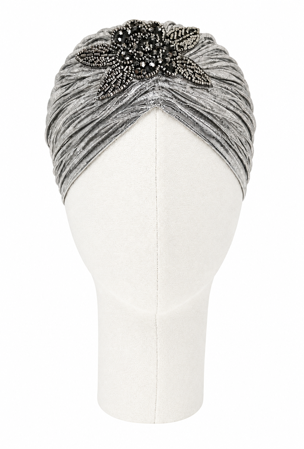 Platinum lamé turban with ruched front and beaded floral embellishment