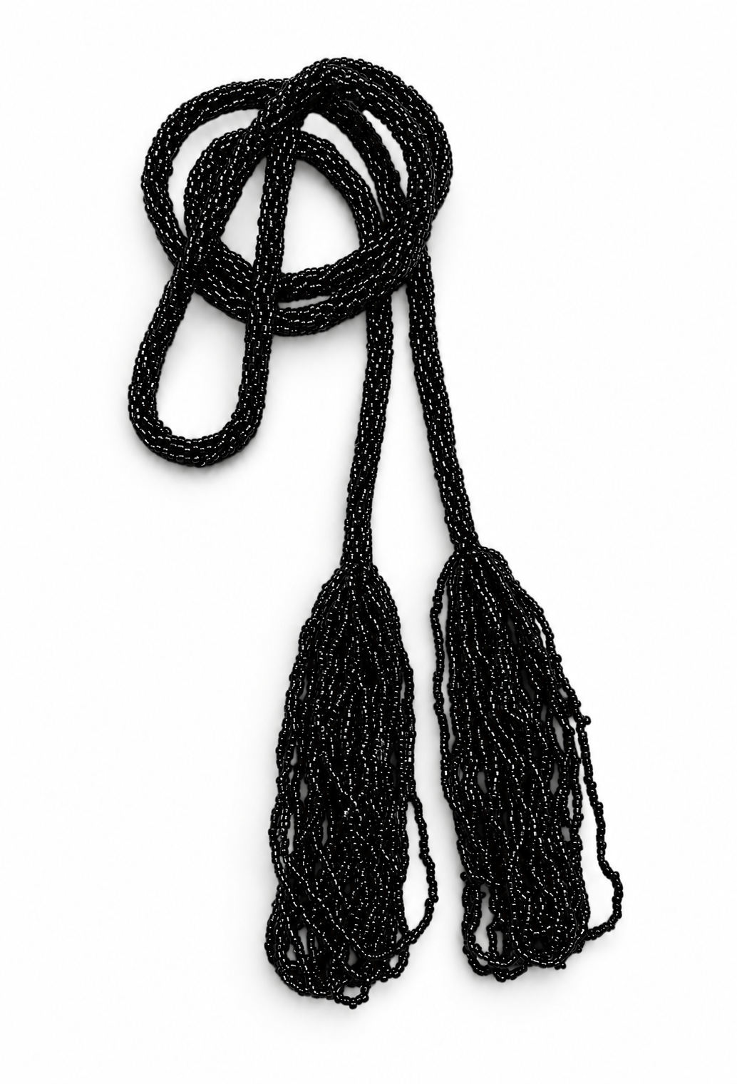 Black lariat necklace with long tassels and braided cord loops