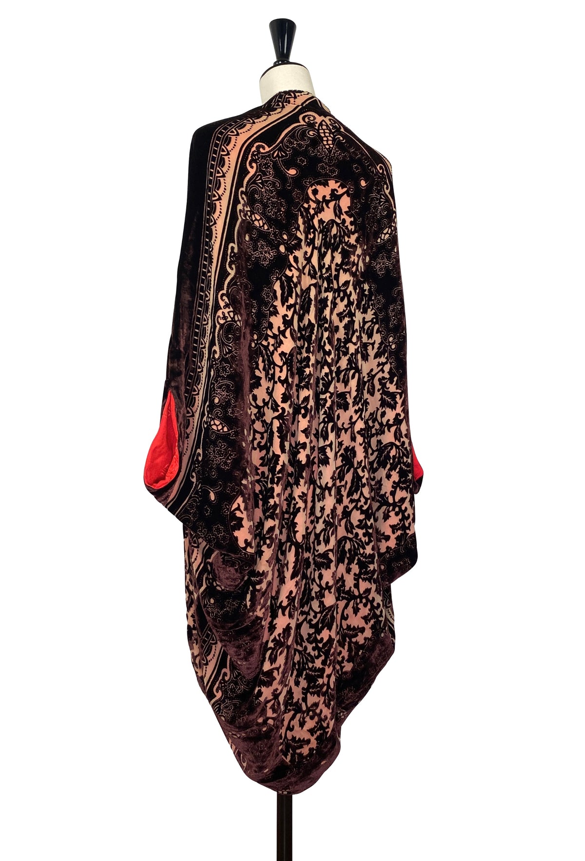Silk velvet cocoon jacket back view in dark brown with ornate gold pattern and crimson accents
