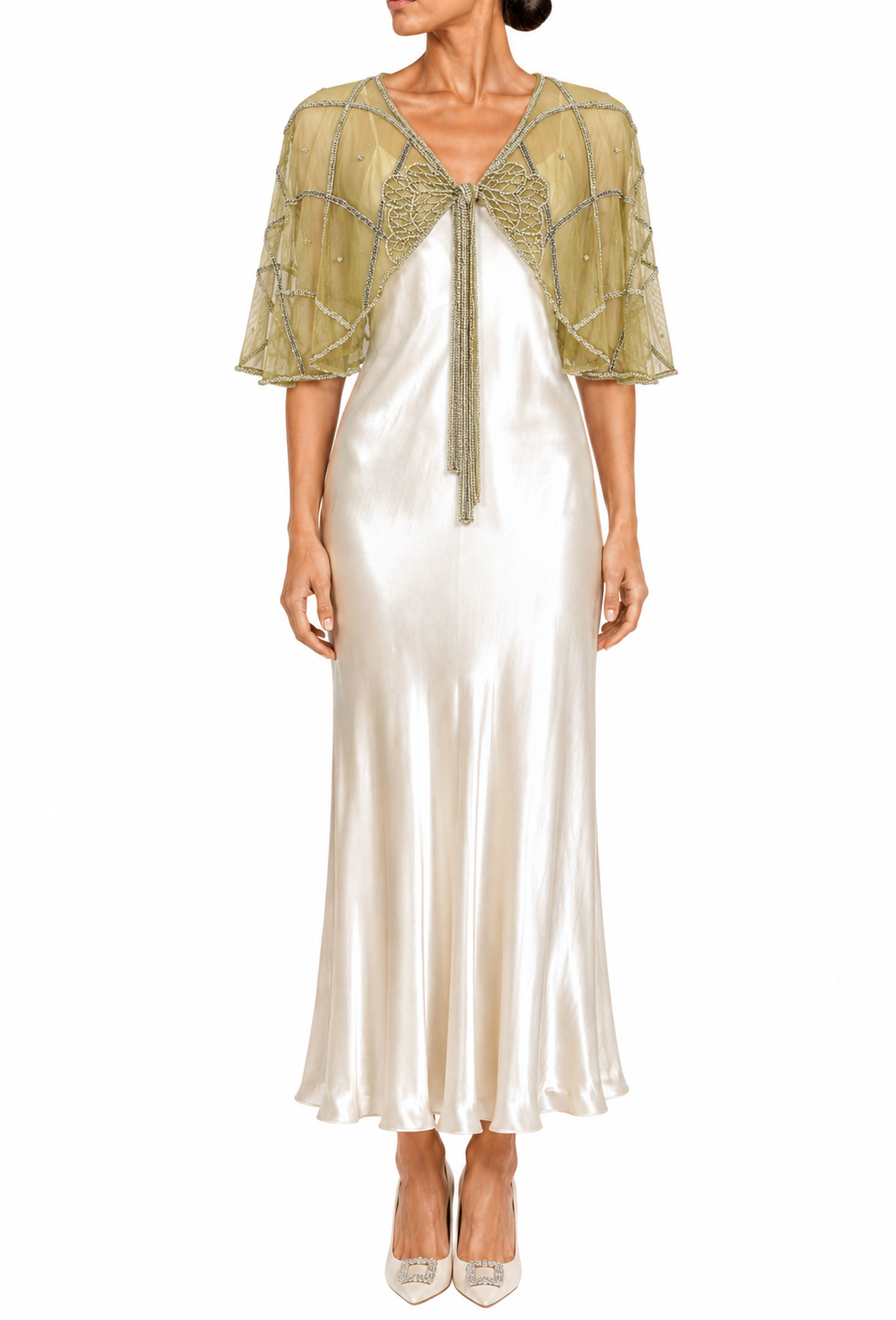 Gold sheer capelet with short sleeves, embroidered trim, and tie at center neckline
