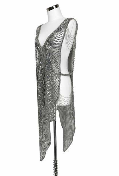 Silver sequin overlay gown with draped side panels, one-shoulder style