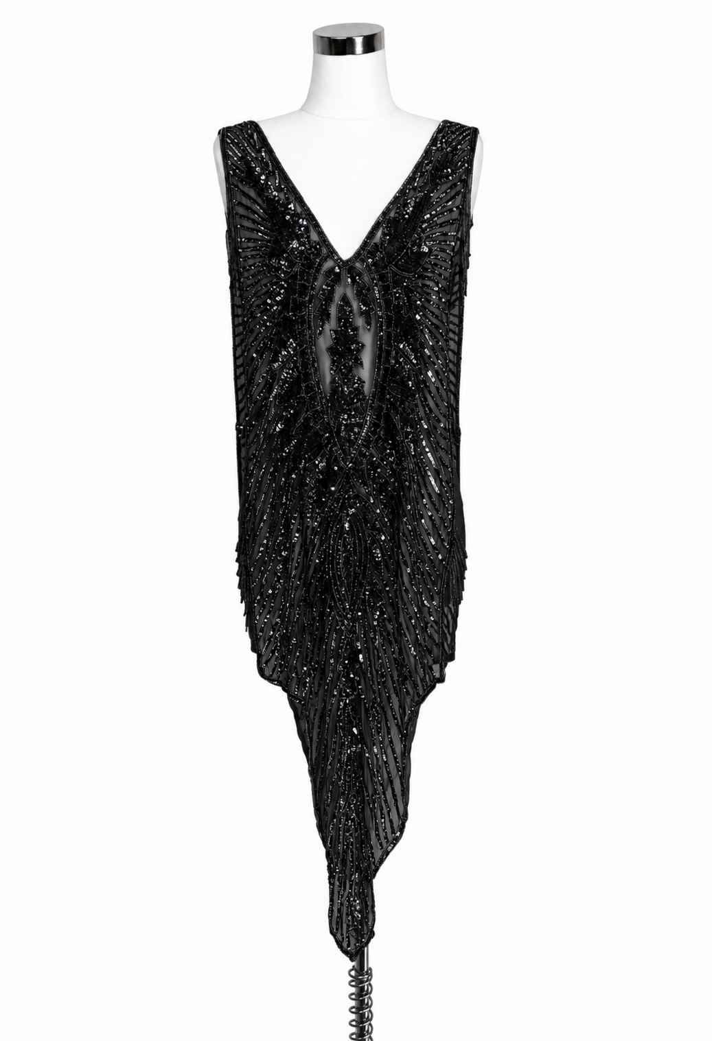 Black sequin overlay gown with deep V neckline and asymmetrical hem