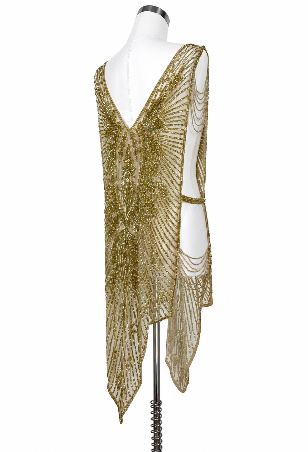 Gold sequin V-neck gown with back drape and hanging chain fringe detail