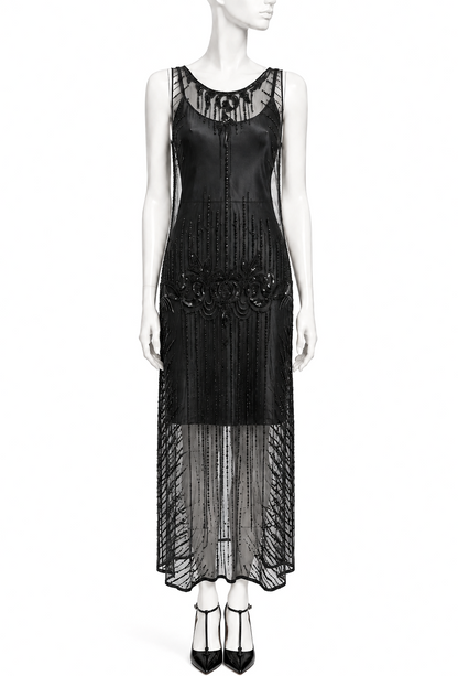 Black sleeveless sheer overlay dress with beaded center panel and scalloped hem