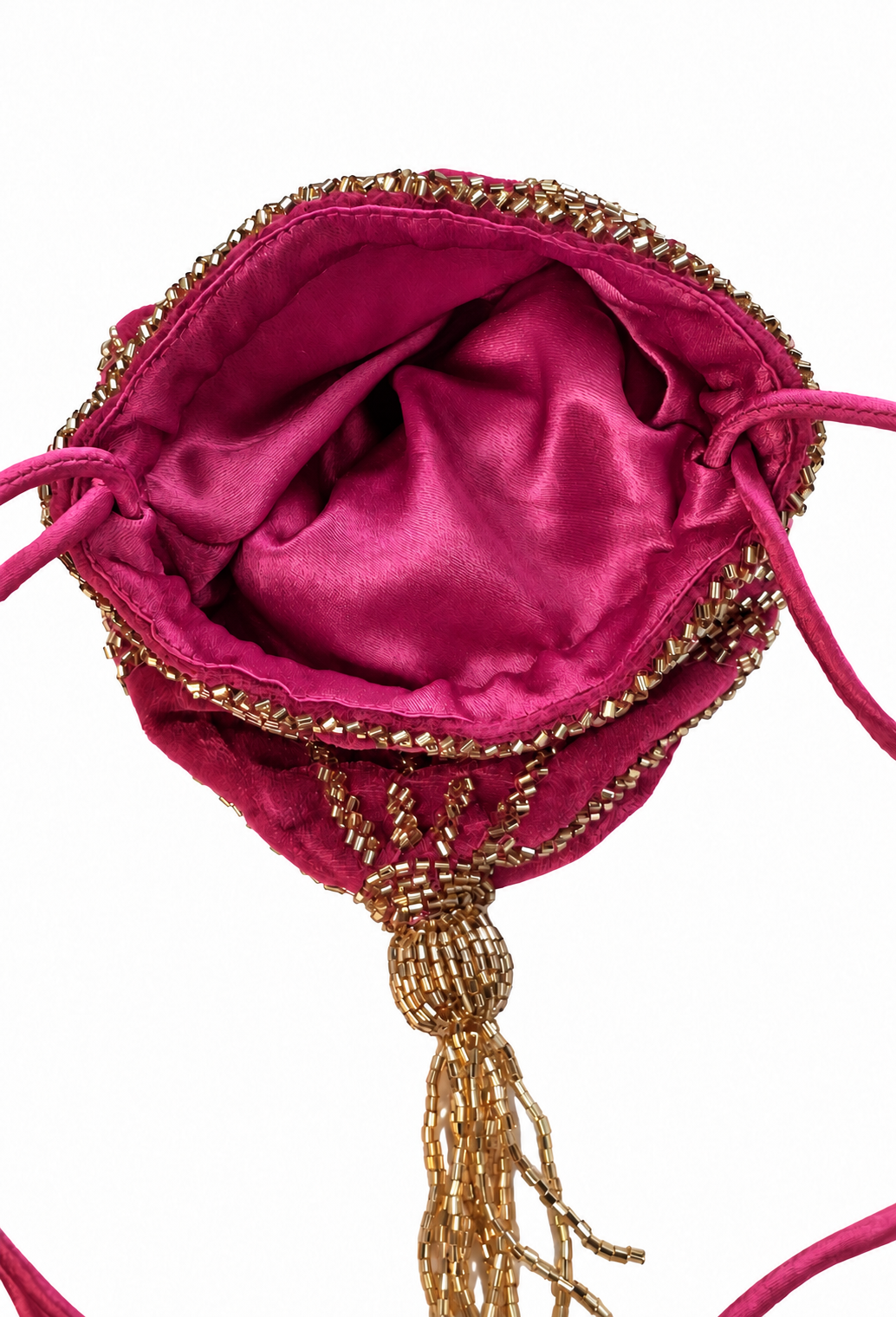 Fuchsia velvet pouch with gold beaded trim, drawstring, and tassel fringe