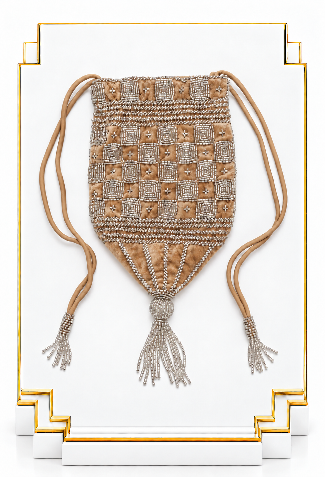 Champagne velvet drawstring pouch with beaded pattern and three tassel cords
