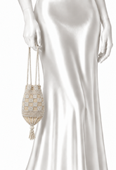 Cream beaded velvet pouch worn with long tassel drawstrings