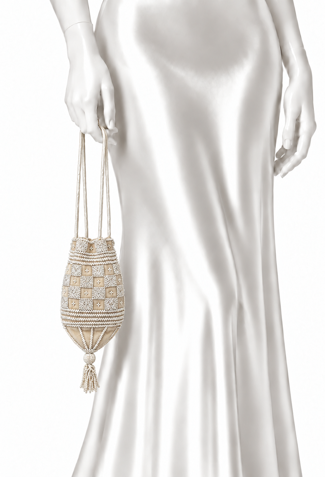 Cream beaded velvet pouch worn with long tassel drawstrings