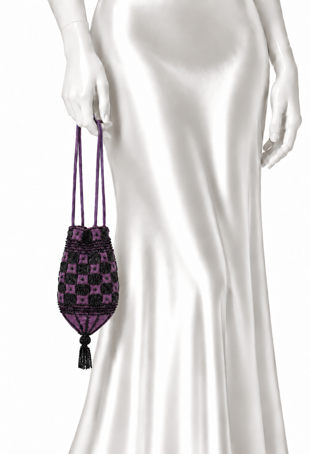 Velvet drawstring pouch with purple check pattern, held by long cord straps