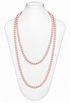 Glass pearl sautoir necklace with blush pink bead strands, double-row design on mannequin