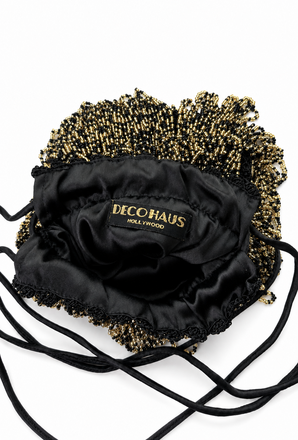 Gold beaded drawstring pochette bag with satin DECOHAUS patch front