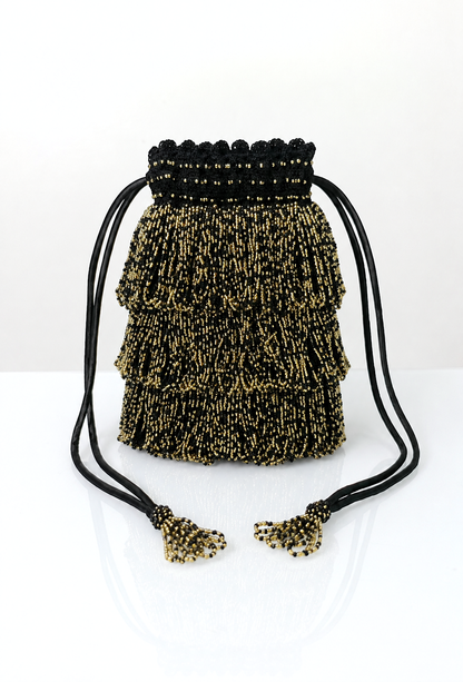 Gold and black beaded drawstring pochette bag with tassel cord ends