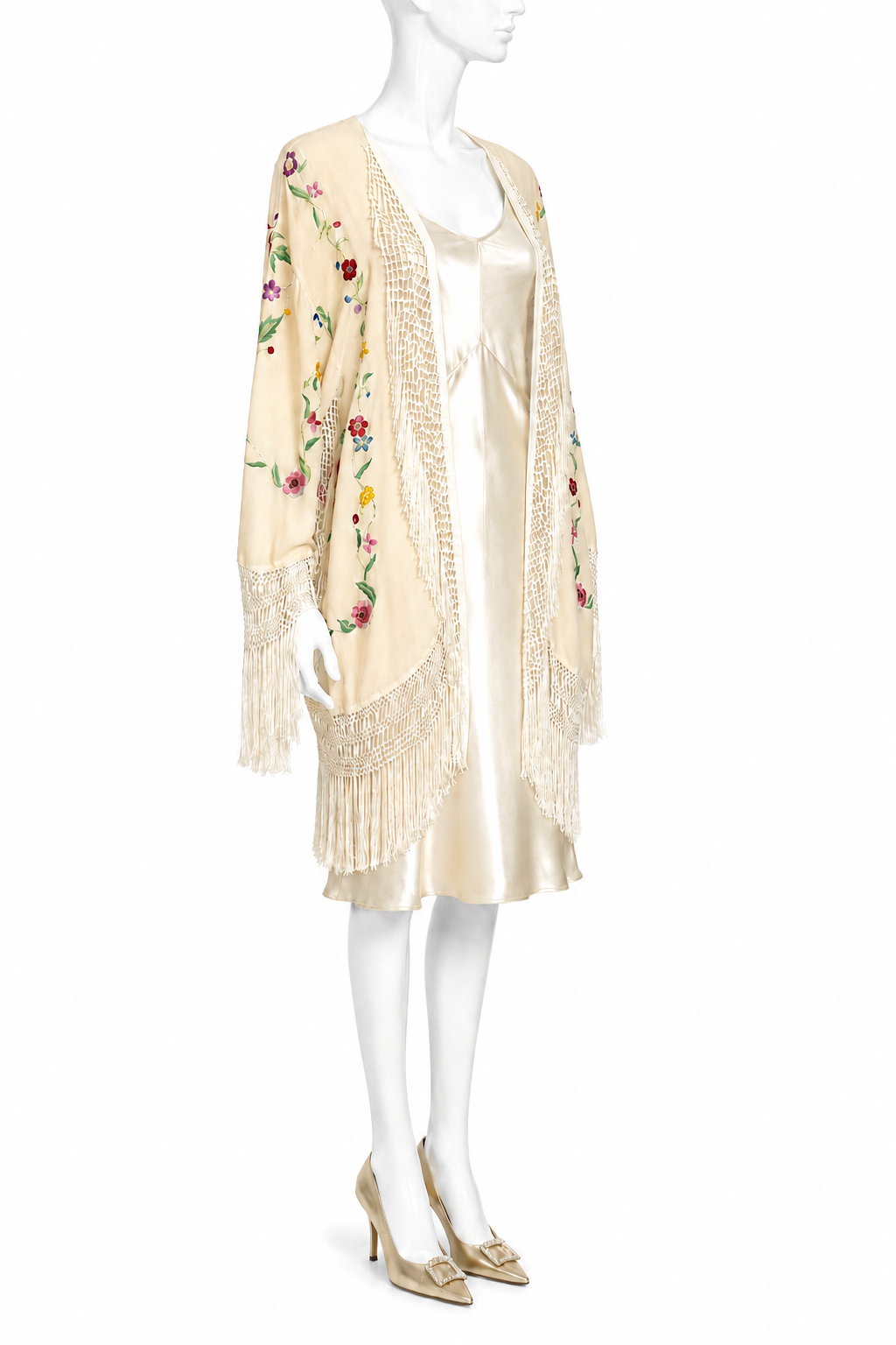 Cream embroidered jacket with floral motif, tassel fringe trim and open front