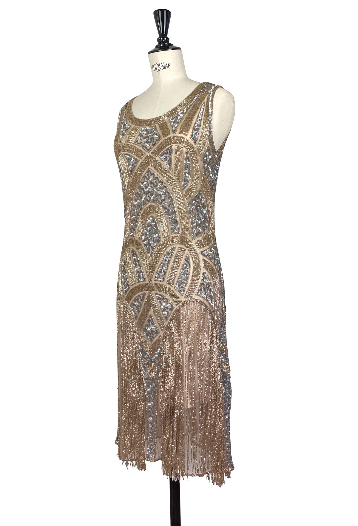 Sleeveless beaded evening gown with gold and blue art deco-inspired motifs, fringe hem