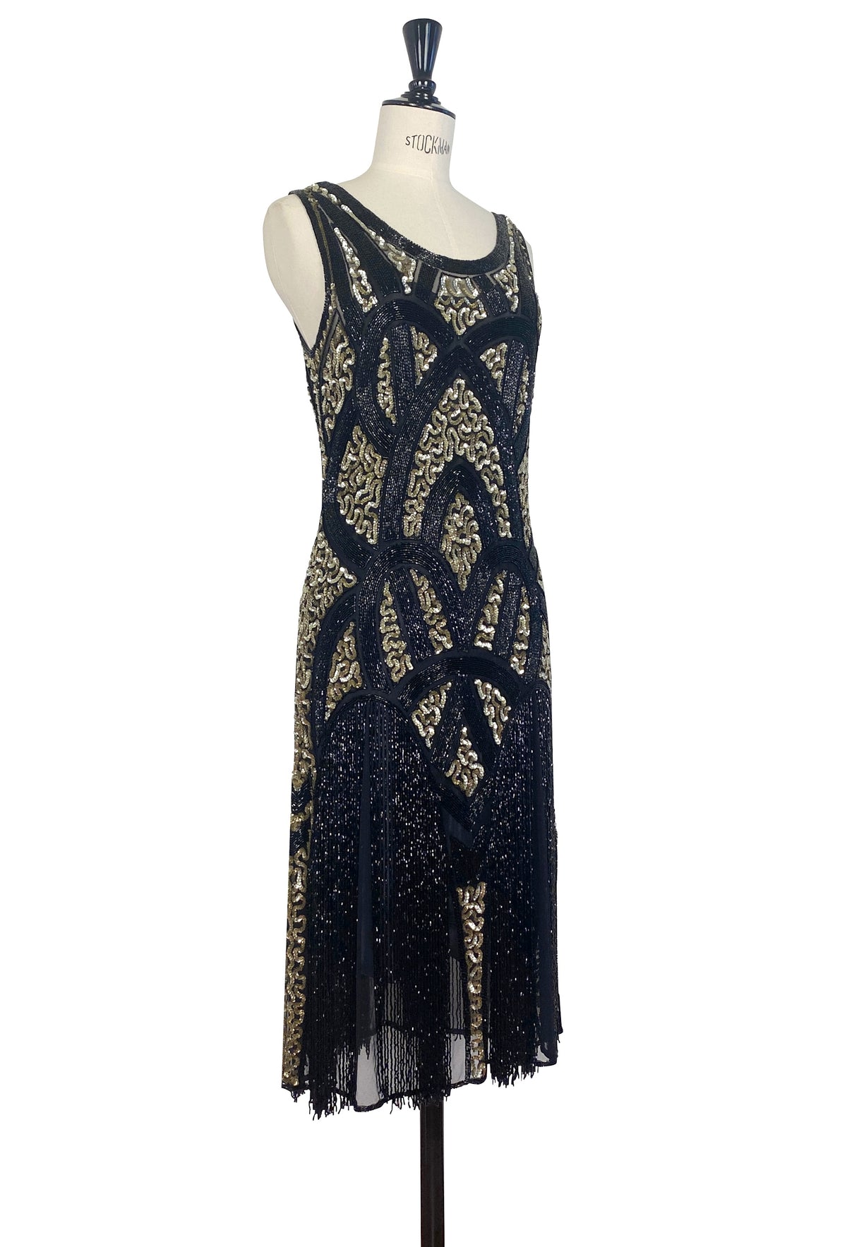 Black sleeveless sequin mini dress with gold filigree design and sheer fringe