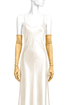 Pair of gold satin opera gloves with ruched cuffs, worn on model hands