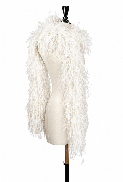 White feather boa with long fringe draped over mannequin torso