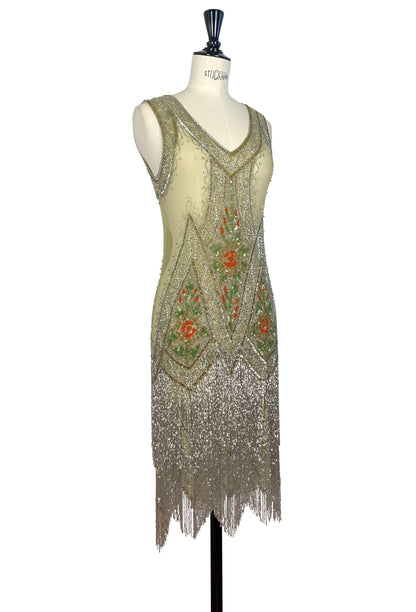 Icon gown Jardin, sleeveless shift silhouette with gold sequins and red and green floral beading