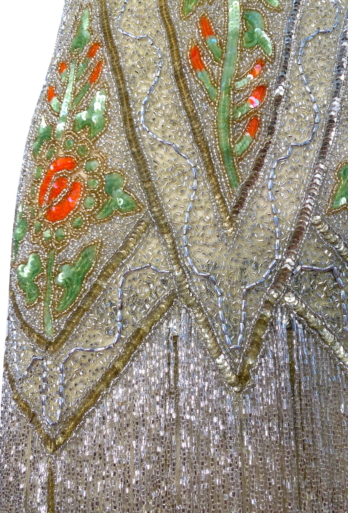 Icon gown Jardin detail, gold beaded pattern with multicolor floral embroidery and V-neck trim