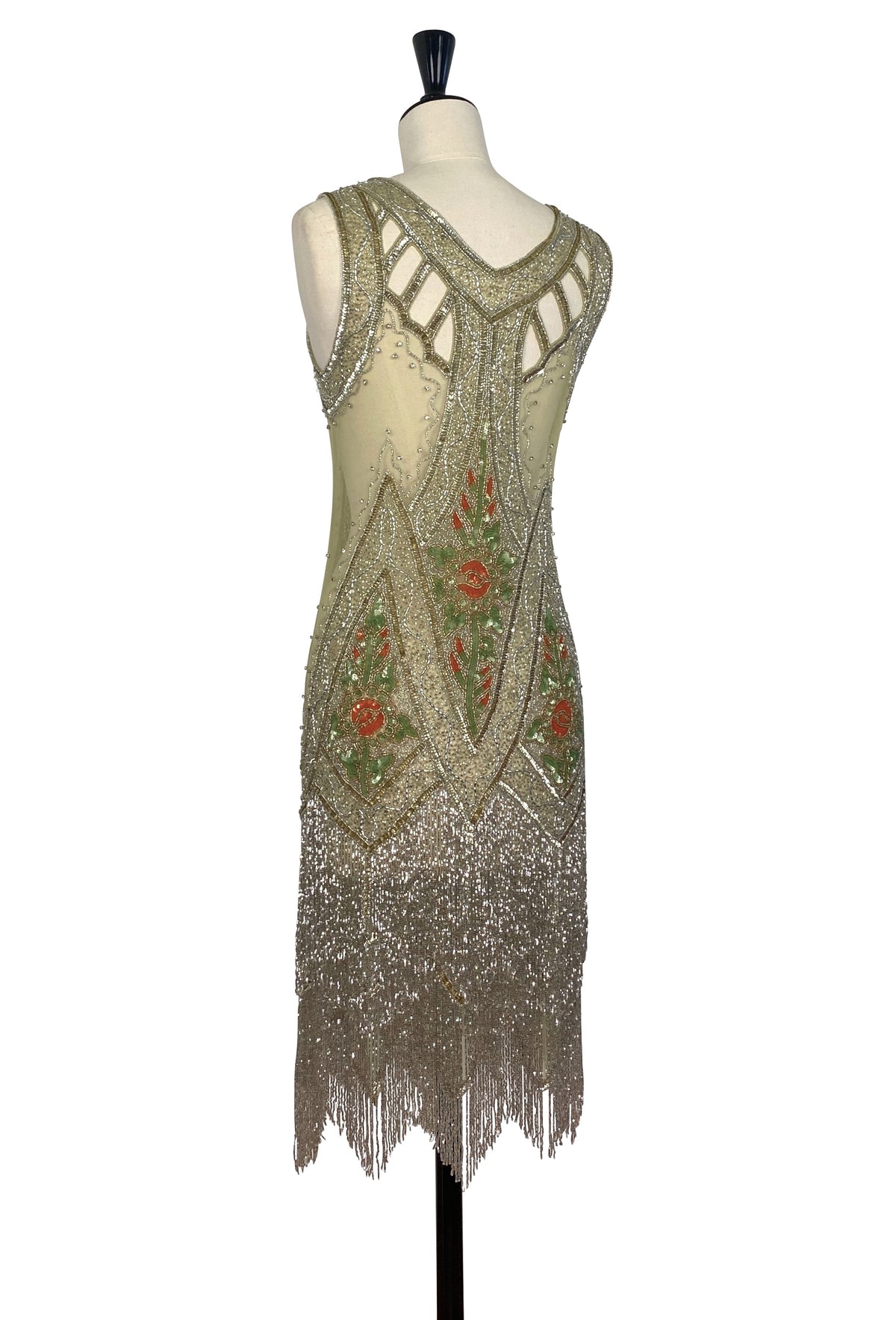 Icon gown Jardin back view, open back with crisscross straps, gold sequins and fringe hem