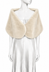 Bisque faux fur shrug with wide shawl collar and open front, draped over shoulders