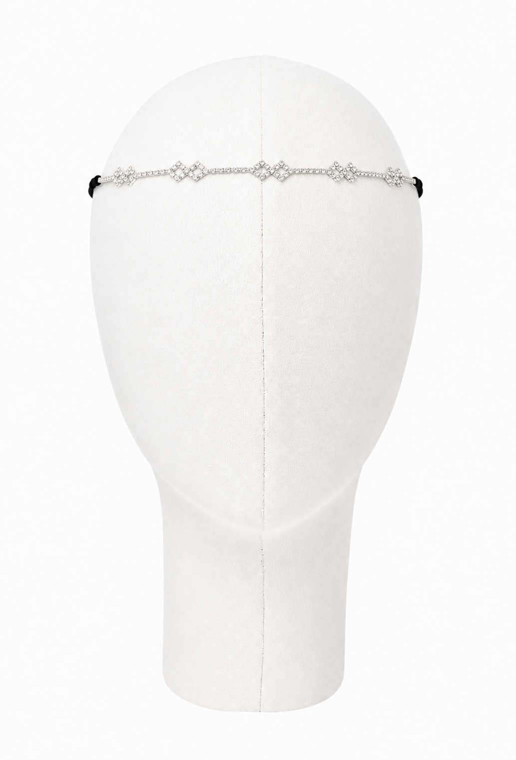 Silvertone diamond-style chain headband with small ribbon ties on a mannequin
