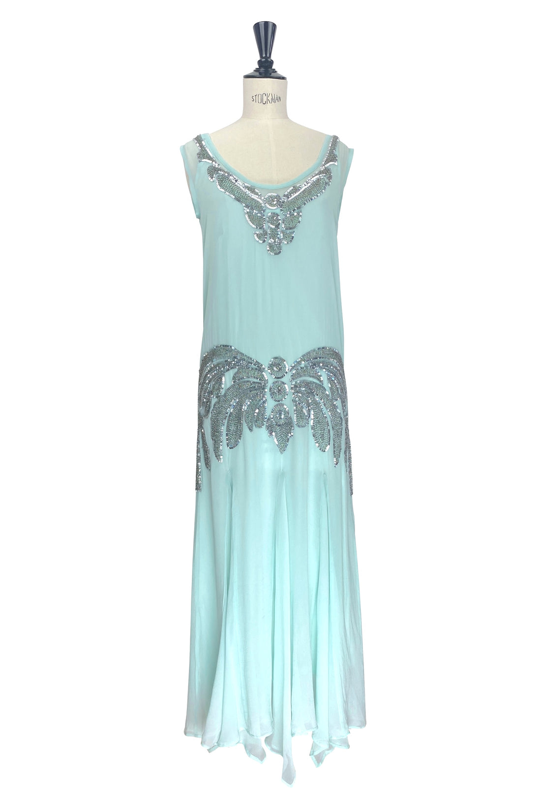 Aqua chiffon gown with silver beaded scoop neckline and embellished skirt, sleeveless.