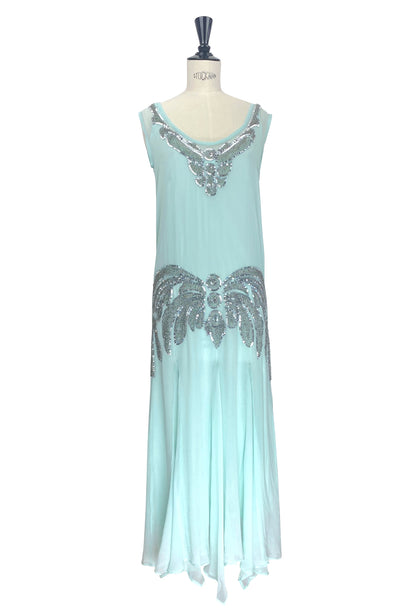 Aqua chiffon gown with silver beaded scoop neckline and embellished skirt, sleeveless.