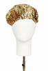 Gold sequin beret with rounded crown and scalloped brim on mannequin
