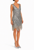 Sleeveless silver sequin chevron cocktail dress on model, V-neck and fringe hem