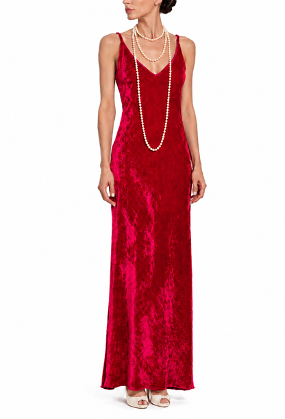 Lipstick red velvet gown with V-neck and sleeveless slim column silhouette