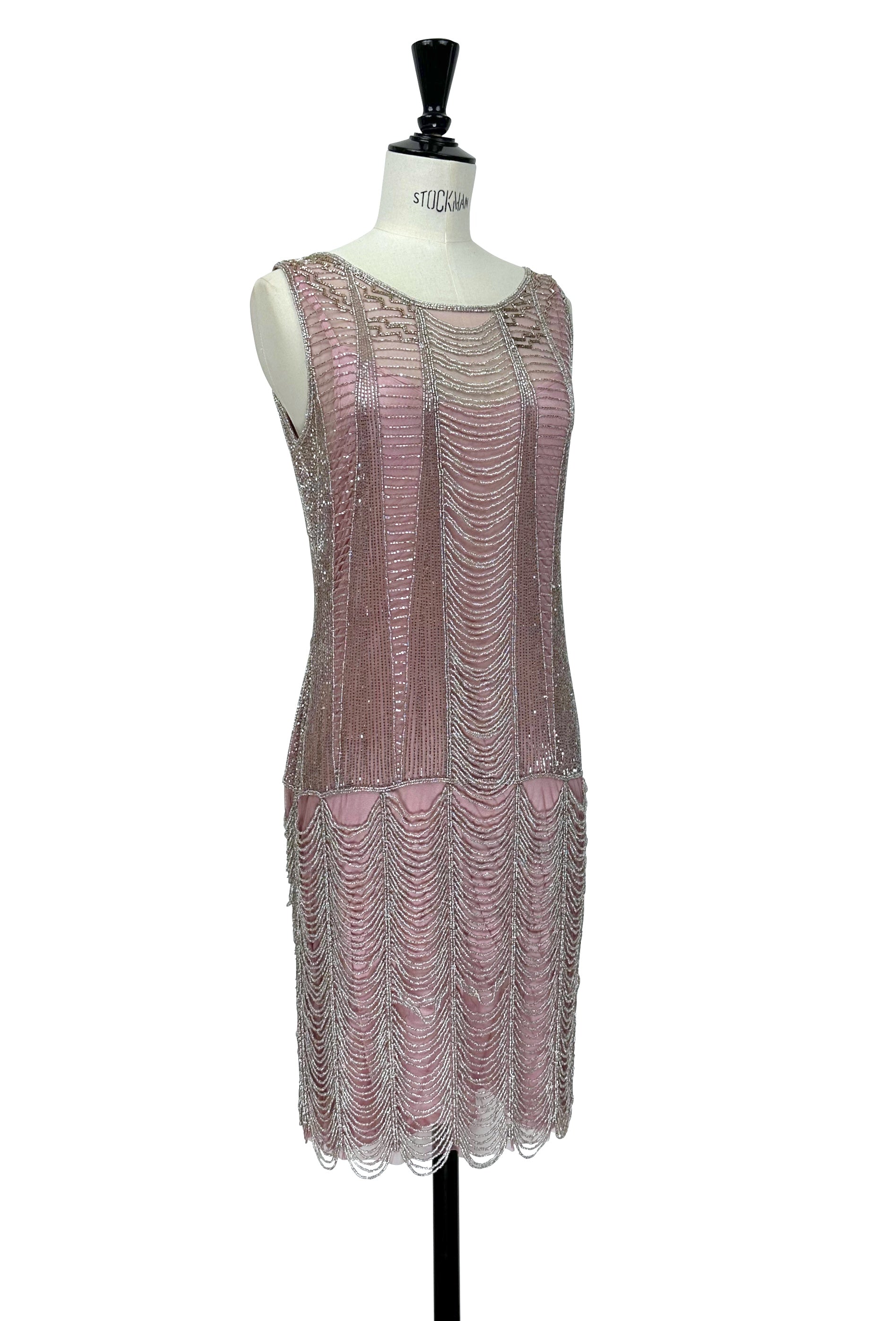 Rose-pink sleeveless beaded mini dress with layered fringe hem and yoke