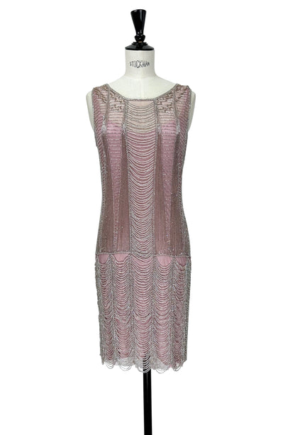 Rose-pink sleeveless beaded mini dress with round neckline and fringe trim
