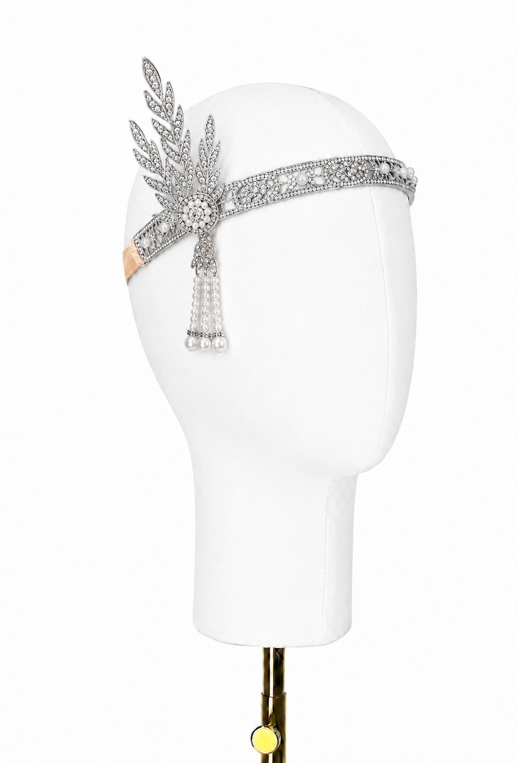 Silver art deco tiara with leaf-like filigree, rhinestones, and hanging pearl drops