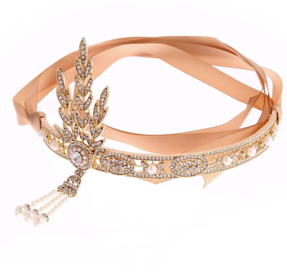 Gilded gold art deco tiara with leaf crown, round clear stones, and beaded fringe