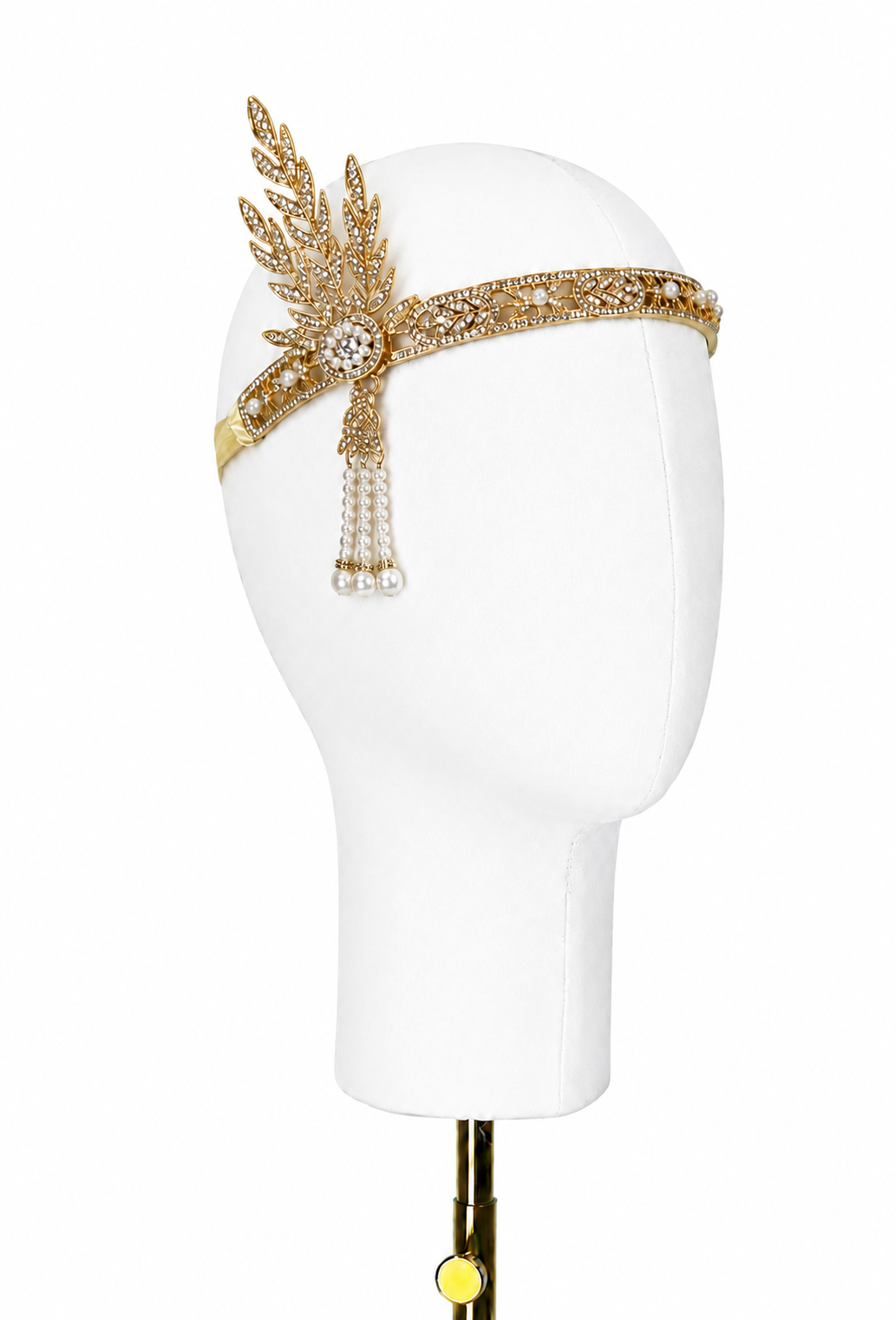 Gold art deco tiara headband with central round stone, leaf motifs, and dangling bead chain