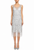 Silver sequin cocktail dress with thin straps, scoop neckline, and straight fringe hem