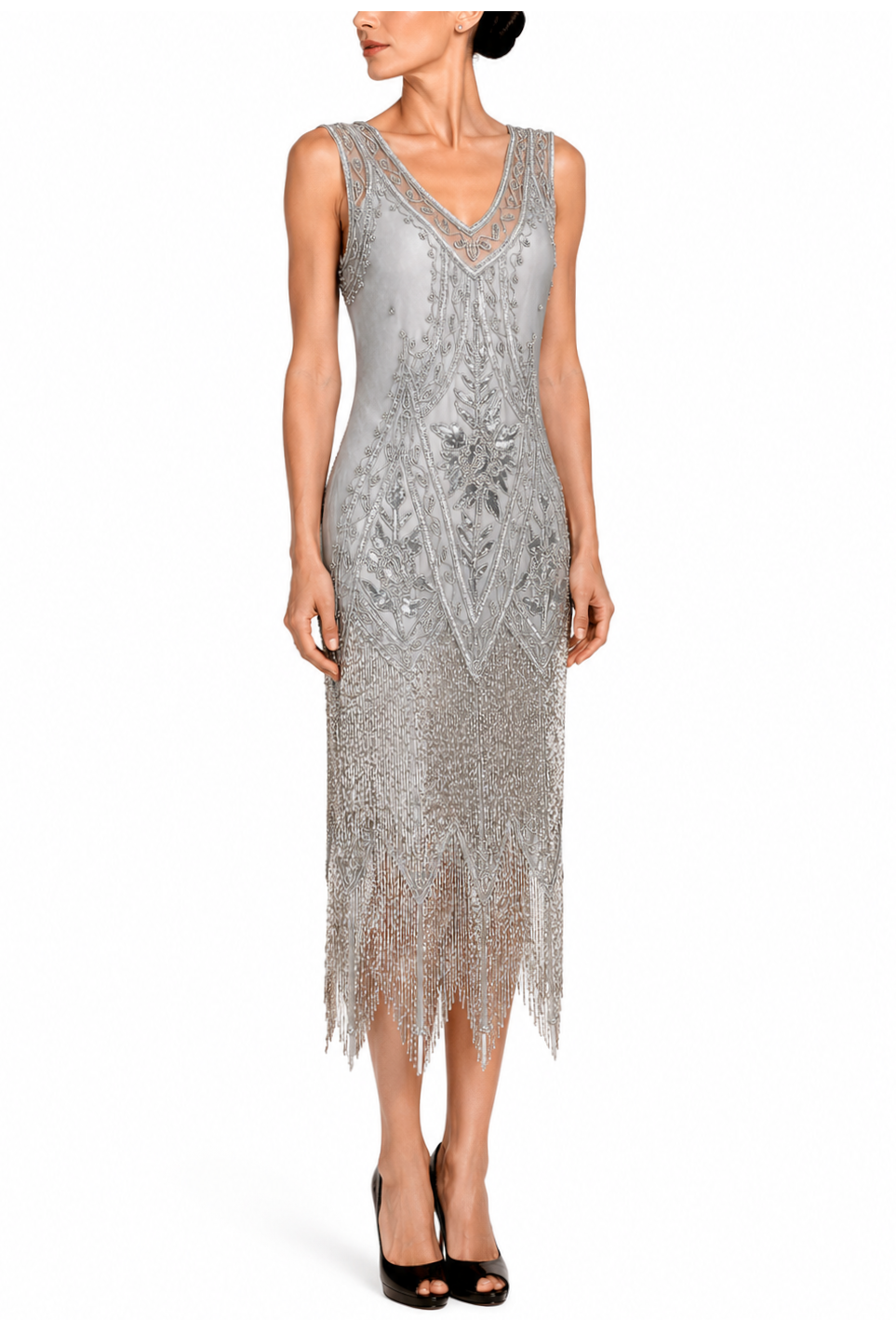 Silver sequin sleeveless evening gown with V-neck and fringe hem on model
