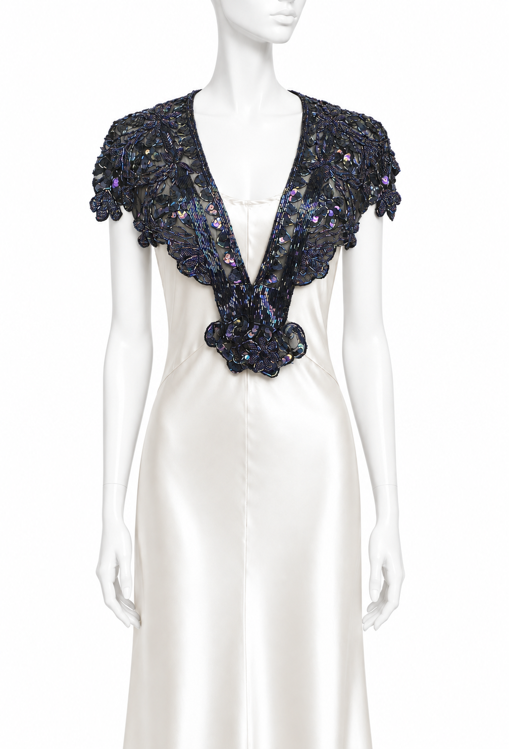 Black sequined medallion capelet with scalloped V neckline and shoulder sleeves