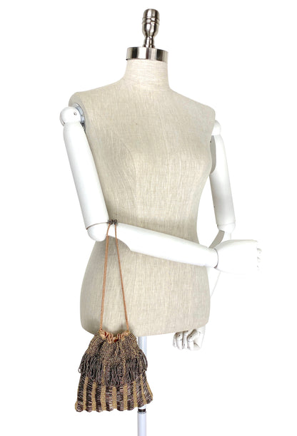 Brown knit drawstring mini pouch with braided cord drawstrings
