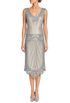 Modernist tabard on model, silver-gray sequined sleeveless V-neck knee-length dress.