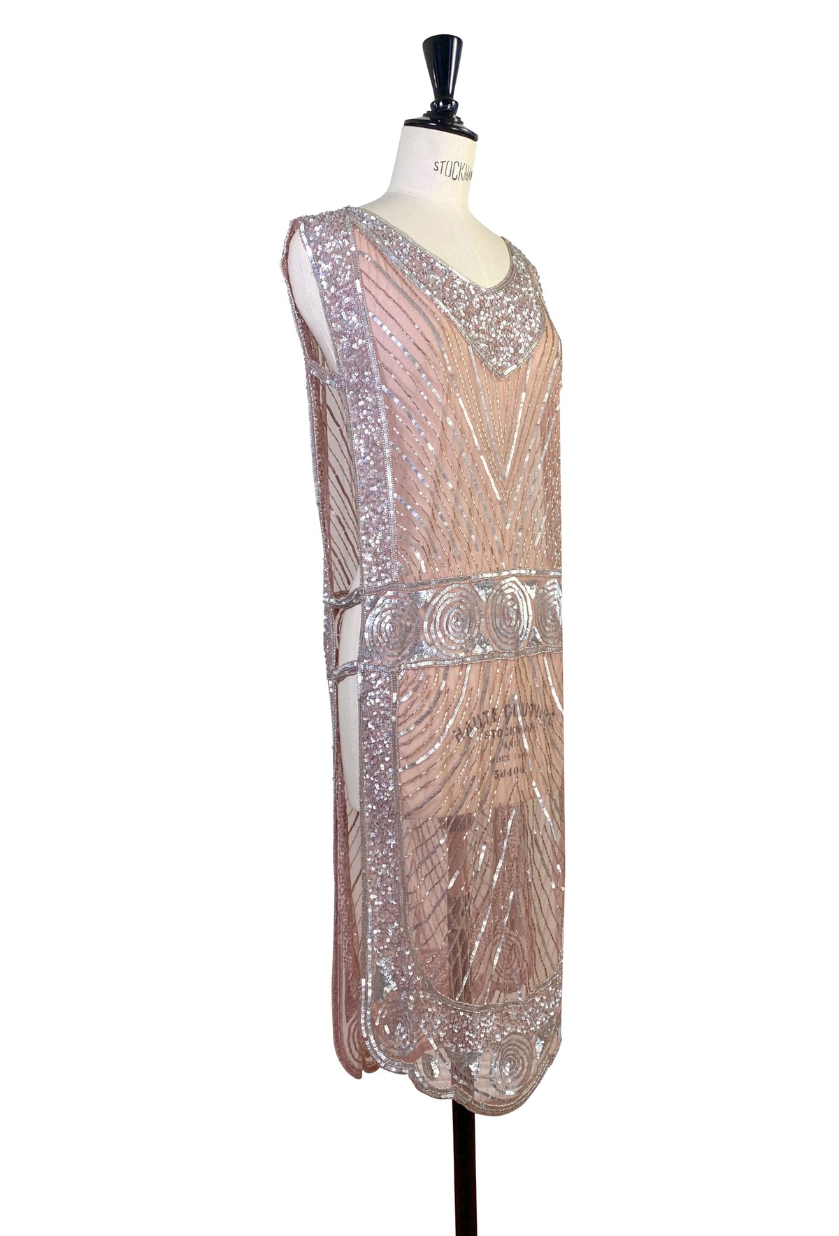 Rose-pink embellished sleeveless tabard with V-neckline and ornate beaded panels