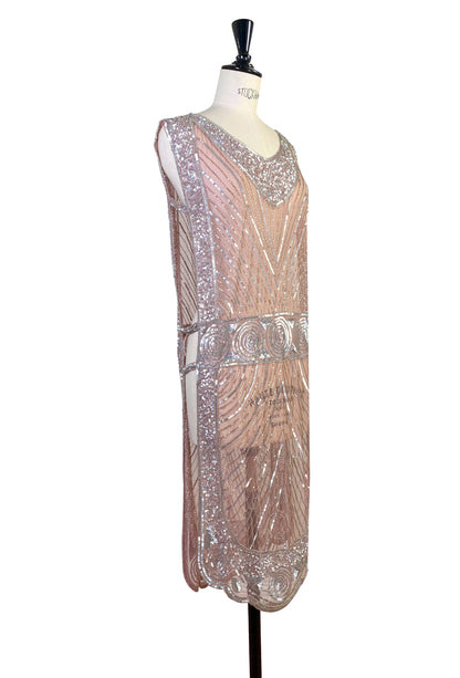 Rose-pink embellished sleeveless tabard with V-neckline and ornate beaded panels