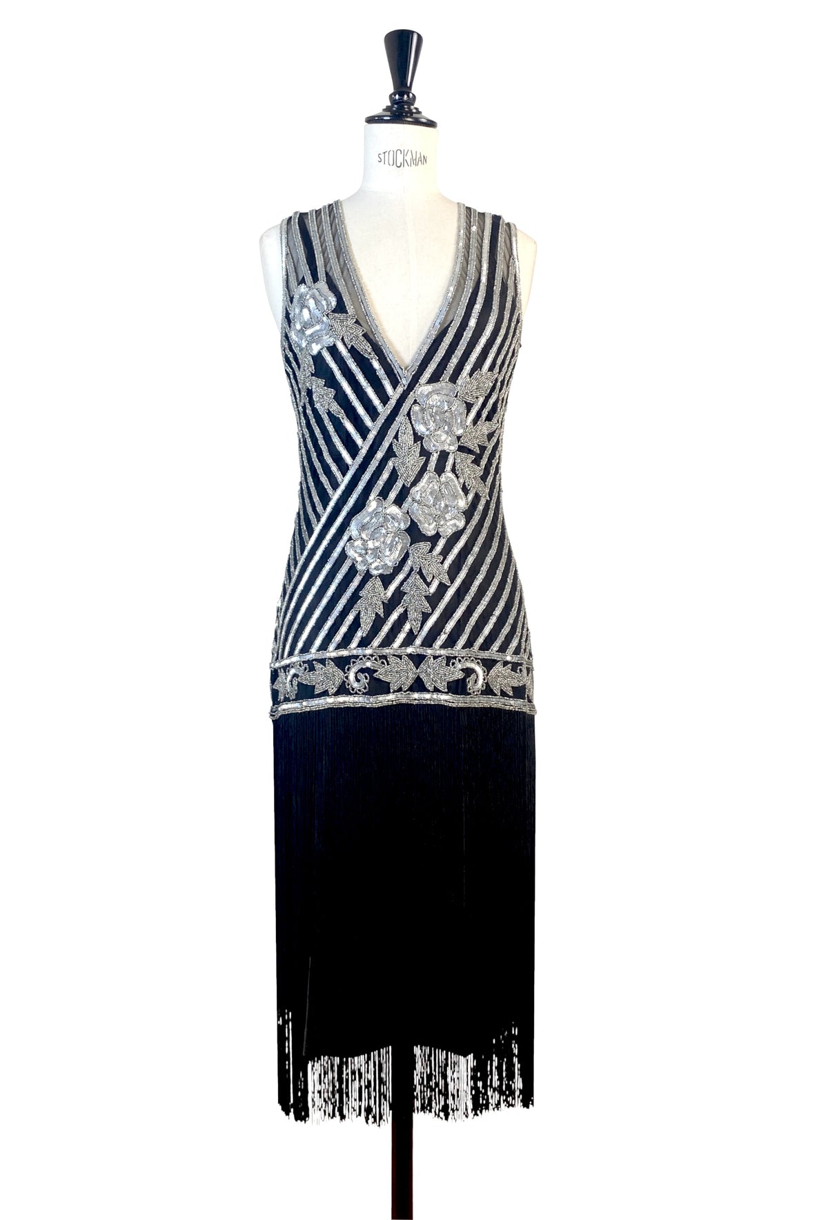 Silver beaded V-neck gown with diagonal stripe pattern, decorative buttons, fringe bottom