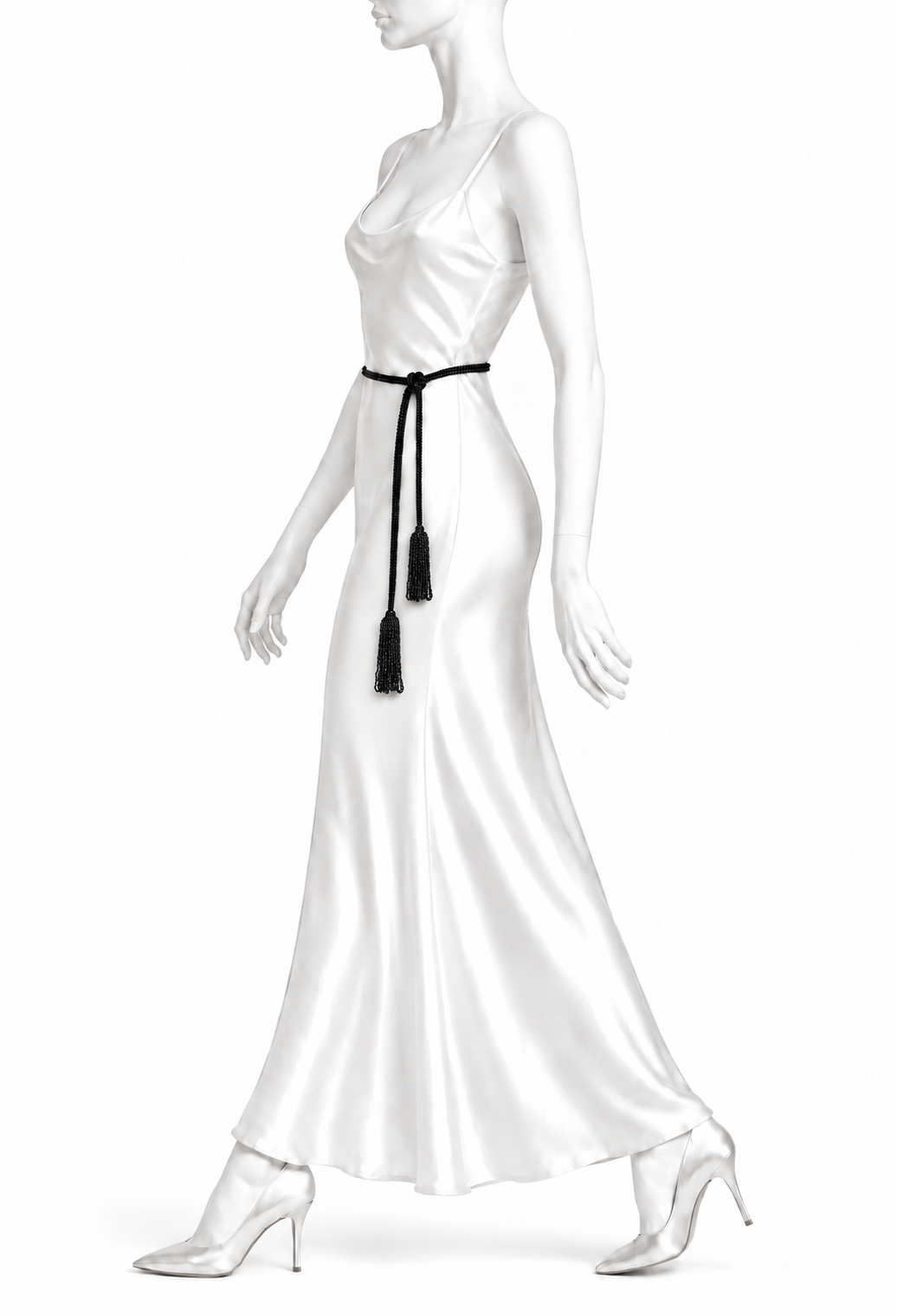 Black tassel lariat belt worn at the waist with long cord ties